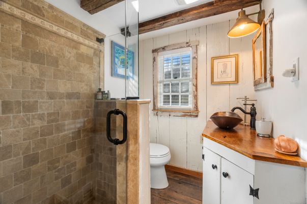 Bathroom, Glass Shower, Interior, Stone Walls, Wood Texture Flooring