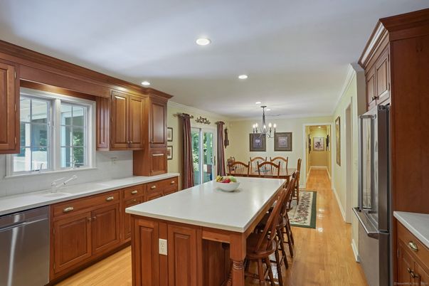 Chandelier, Dining room, Interior, Kitchen, Recessed Lighting, Stainless Steel Appliances, Wood Texture Flooring