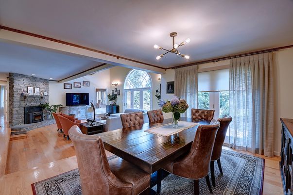 Dining room, Fireplace, Interior, Living room, Pendant Lights, Stone Walls, Wood Texture Flooring