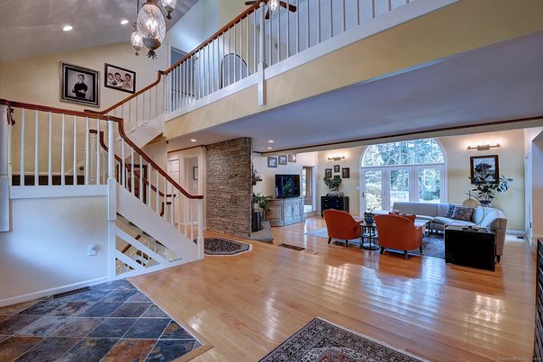 Chandelier, Fireplace, Interior, Living room, Recessed Lighting, Wood Texture Flooring