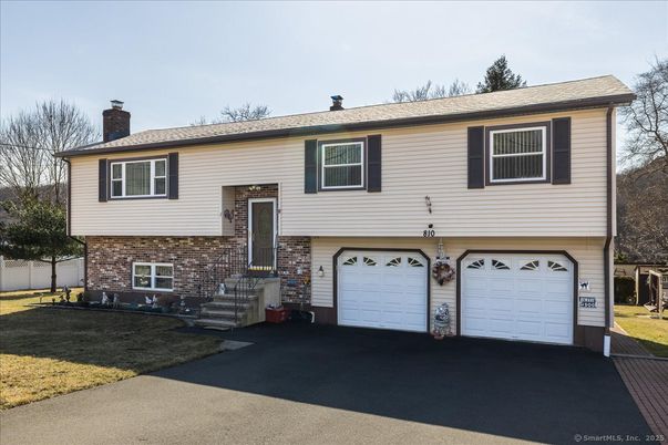 Attached, Exterior, Facade, Brick Facade, Raised Ranch