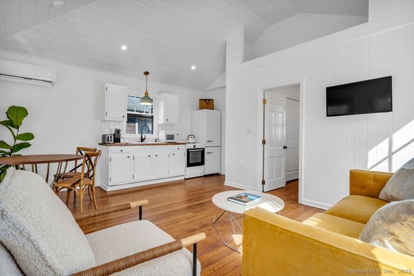 Dining room, Interior, Kitchen, Living room, Pendant Lights, Recessed Lighting, Stainless Steel Appliances, Wood Texture Flooring