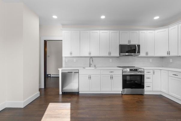 Interior, Kitchen, Recessed Lighting, Stainless Steel Appliances, Wood Texture Flooring
