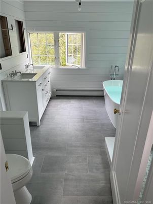 Bathroom, Dual Sink Vanities, Free Standing Baths, Interior, Wood Texture Flooring