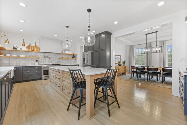 Dining room, Interior, Kitchen, Pendant Lights, Recessed Lighting, Stainless Steel Appliances, Wood Texture Flooring