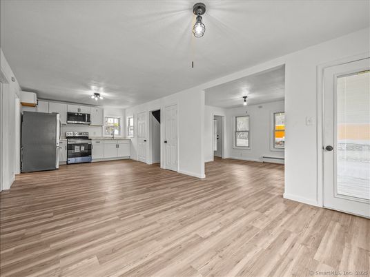 Empty room, Interior, Kitchen, Stainless Steel Appliances, Wood Texture Flooring