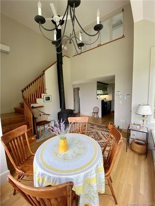 Chandelier, Dining room, Fireplace, Interior, Wood Texture Flooring