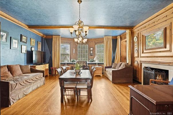 Chandelier, Dining room, Fireplace, Interior, Living room, Wooden Beams, Wood Texture Flooring, Wooden Walls