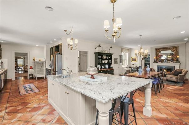 Chandelier, Fireplace, Interior, Kitchen, Living room, Pendant Lights, Recessed Lighting, Stainless Steel Appliances