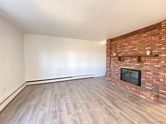 Empty room, Fireplace, Interior, Stone Walls, Wood Texture Flooring