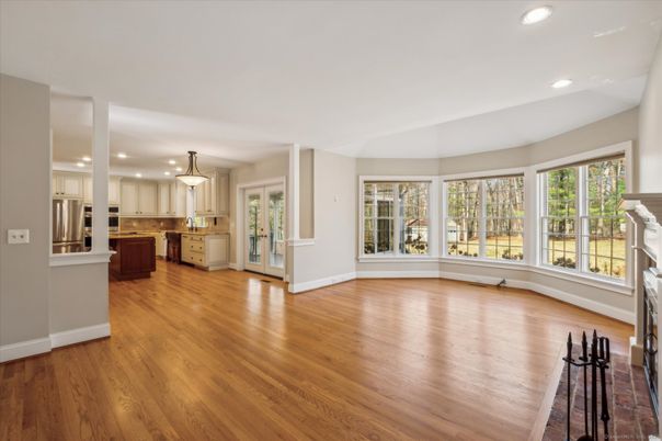 Fireplace, Interior, Kitchen, Pendant Lights, Recessed Lighting, Stainless Steel Appliances, Wood Texture Flooring