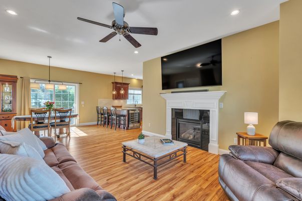Dining room, Fireplace, Interior, Living room, Pendant Lights, Recessed Lighting, Wood Texture Flooring