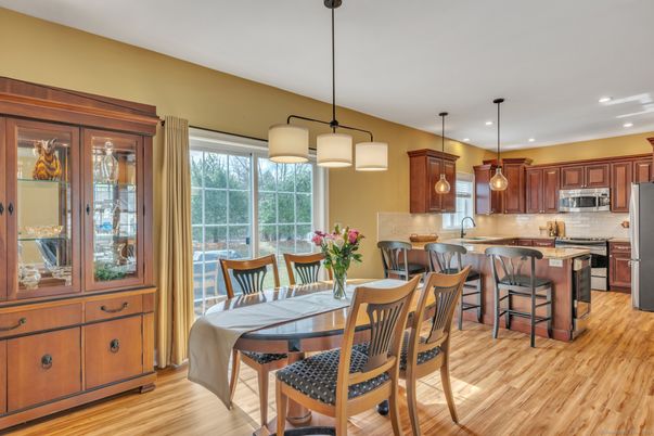 Dining room, Interior, Kitchen, Pendant Lights, Recessed Lighting, Stainless Steel Appliances, Wood Texture Flooring