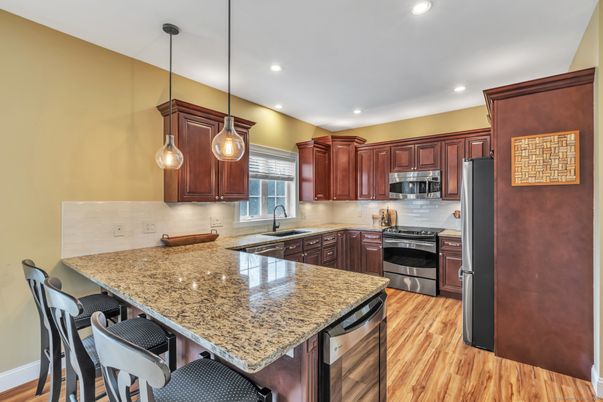 Interior, Kitchen, Pendant Lights, Recessed Lighting, Stainless Steel Appliances, Wood Texture Flooring