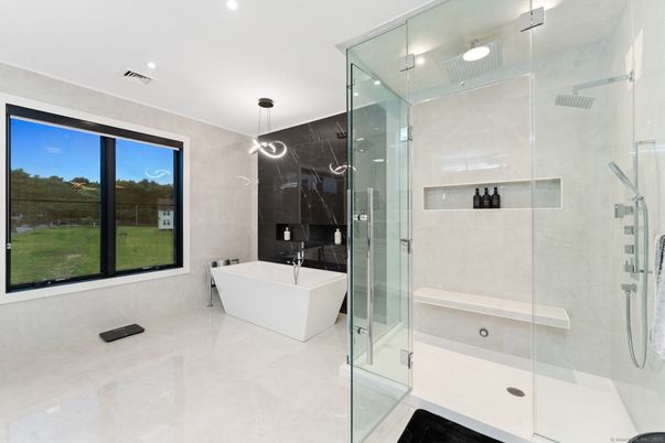 Bathroom, Free Standing Baths, Glass Shower, Interior, Marble Walls, Pendant Lights, Recessed Lighting
