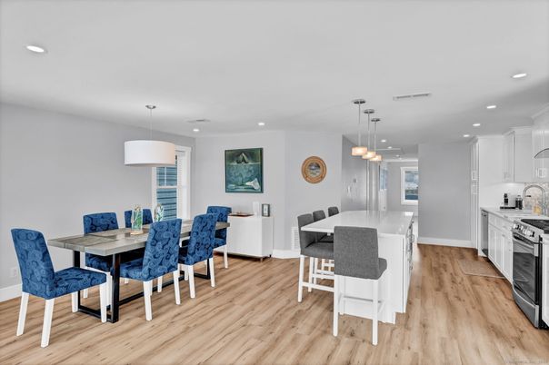 Dining room, Interior, Kitchen, Pendant Lights, Recessed Lighting, Stainless Steel Appliances, Wood Texture Flooring