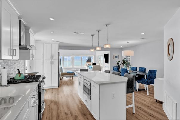 Dining room, Interior, Kitchen, Pendant Lights, Recessed Lighting, Stainless Steel Appliances, Wood Texture Flooring