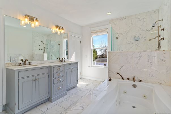 Bathroom, Dual Sink Vanities, Interior, Marble, Marble Walls, Recessed Lighting