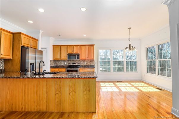 Interior, Kitchen, Pendant Lights, Recessed Lighting, Stainless Steel Appliances, Wood Texture Flooring