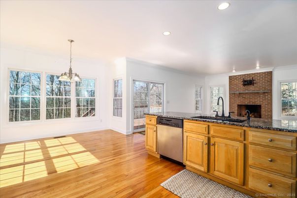 Fireplace, Interior, Kitchen, Pendant Lights, Recessed Lighting, Stone Walls, Wood Texture Flooring