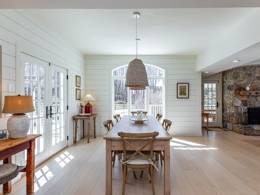 Dining room, Fireplace, Interior, Pendant Lights, Recessed Lighting, Stone Walls, Wood Texture Flooring