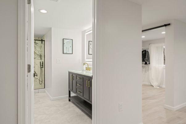 Bathroom, Glass Shower, Interior, Marble, Marble Walls, Recessed Lighting, Wood Texture Flooring