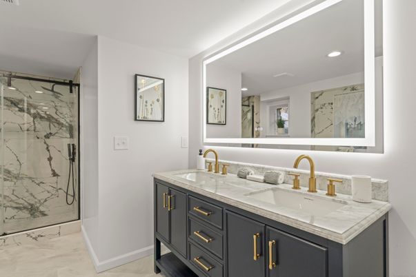 Bathroom, Dual Sink Vanities, Glass Shower, Interior, Marble, Marble Walls, Recessed Lighting