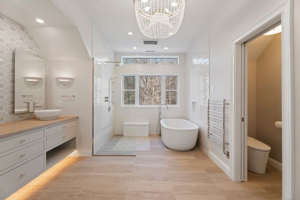 Bathroom, Chandelier, Free Standing Baths, Glass Shower, Interior, Recessed Lighting, Wood Texture Flooring