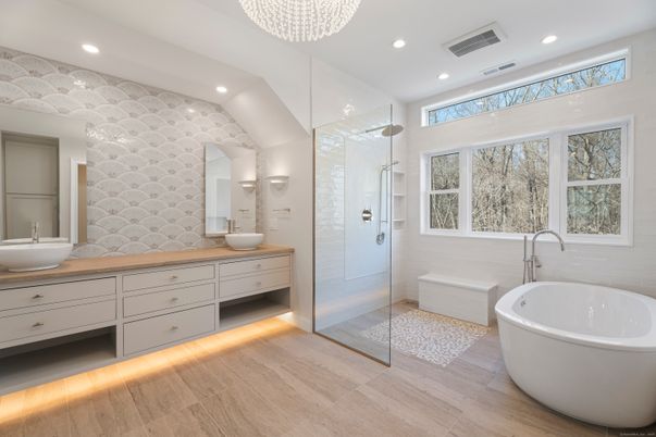 Bathroom, Dual Sink Vanities, Free Standing Baths, Glass Shower, Interior, Recessed Lighting, Wood Texture Flooring