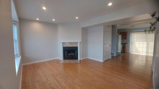 Empty room, Fireplace, Interior, Recessed Lighting, Wood Texture Flooring