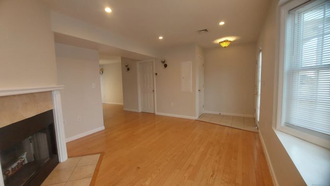 Empty room, Fireplace, Interior, Recessed Lighting, Wood Texture Flooring
