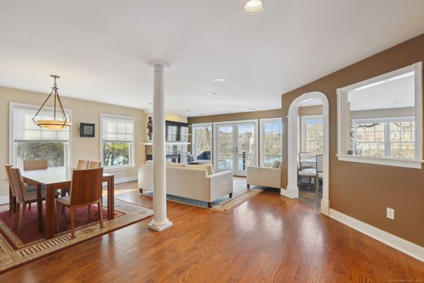Dining room, Fireplace, Interior, Living room, Pendant Lights, Recessed Lighting, Wood Texture Flooring