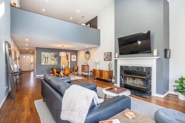 Dining room, Fireplace, Interior, Living room, Pendant Lights, Recessed Lighting, Wood Texture Flooring