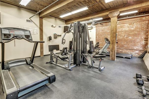 Fitness Equipment, Interior, Stone Walls, Wooden Beams