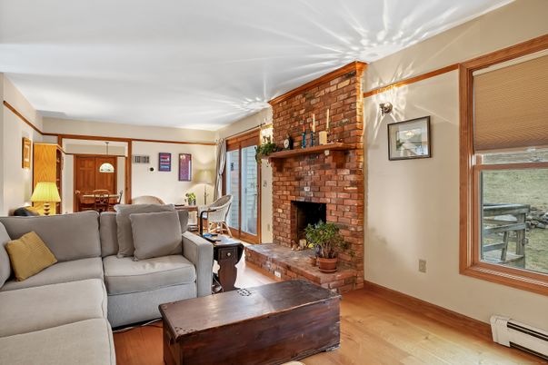 Dining room, Fireplace, Interior, Living room, Stone Walls, Wood Texture Flooring