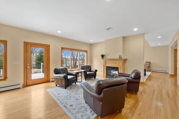 Fireplace, Interior, Living room, Recessed Lighting, Wood Texture Flooring