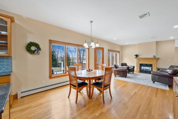 Dining room, Fireplace, Interior, Living room, Pendant Lights, Recessed Lighting, Wood Texture Flooring