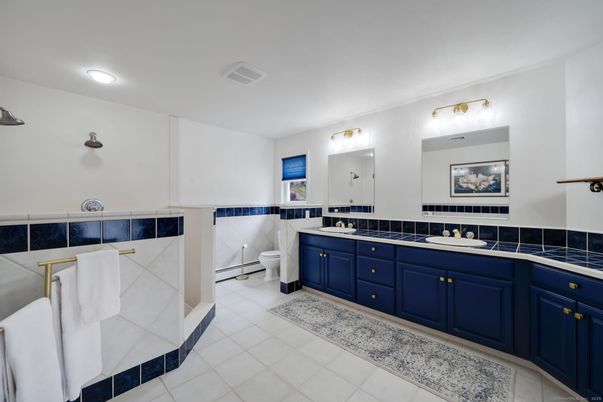 Bathroom, Dual Sink Vanities, Interior, Recessed Lighting, Tile Countertops