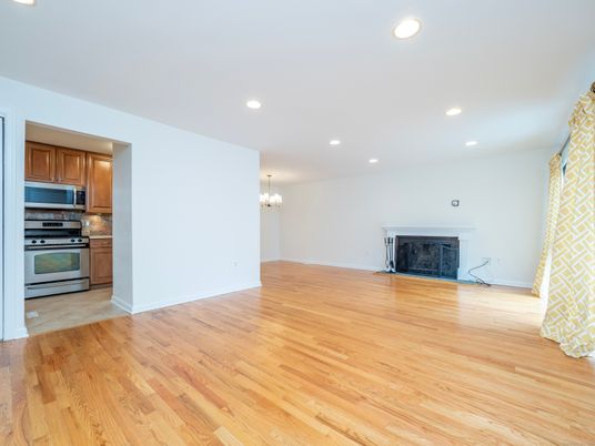 Chandelier, Empty room, Fireplace, Interior, Kitchen, Recessed Lighting, Wood Texture Flooring