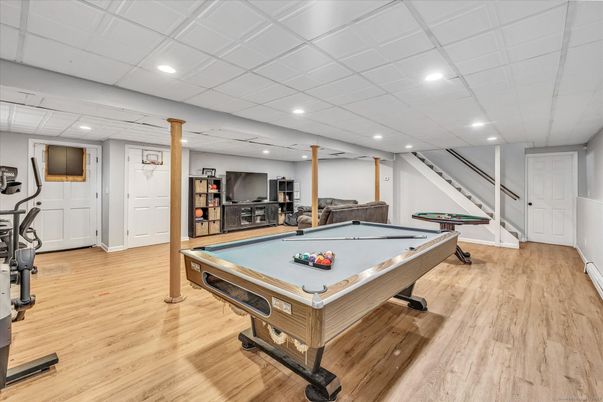 Billiard Table, Fitness Equipment, Game Room, Interior, Recessed Lighting, Wood Texture Flooring