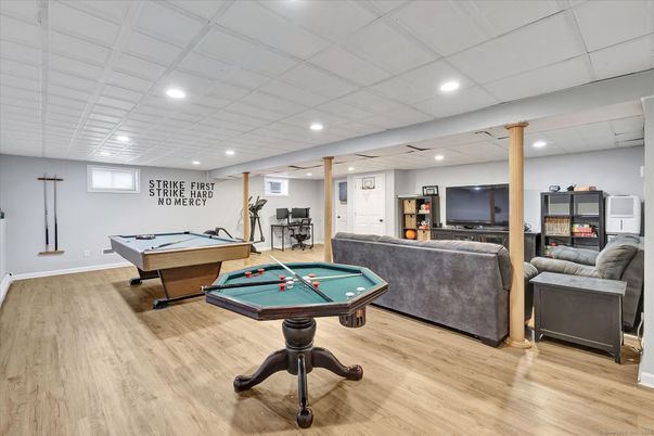Billiard Table, Fitness Equipment, Game Room, Interior, Living room, Recessed Lighting, Wood Texture Flooring