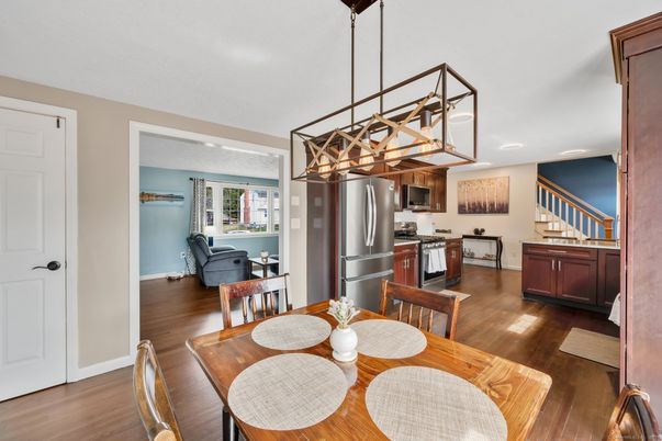 Dining room, Interior, Kitchen, Pendant Lights, Recessed Lighting, Stainless Steel Appliances, Wood Texture Flooring