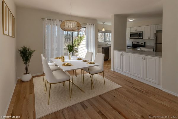 Dining room, Interior, Kitchen, Pendant Lights, Stainless Steel Appliances, Wood Texture Flooring