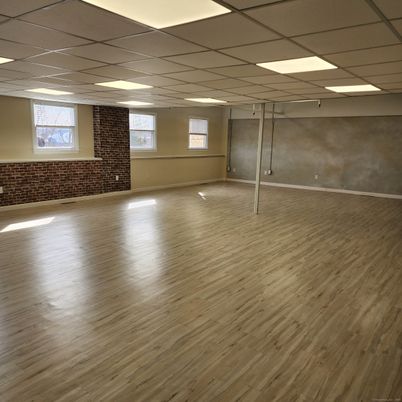 Empty room, Interior, Recessed Lighting, Stone Walls, Wood Texture Flooring