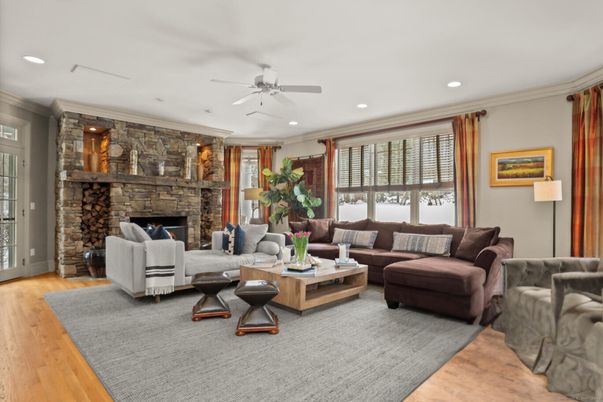 Fireplace, Interior, Living room, Recessed Lighting, Stone Walls, Wood Texture Flooring