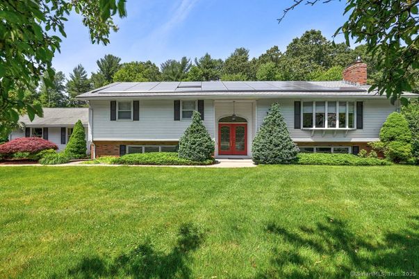 Attached, Backyard, Exterior, Facade, Solar Panels, Raised Ranch