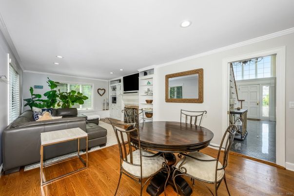 Dining room, Fireplace, Interior, Living room, Recessed Lighting, Wood Texture Flooring