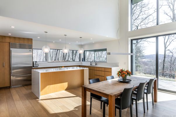 Dining room, Interior, Kitchen, Pendant Lights, Recessed Lighting, Stainless Steel Appliances, Wood Texture Flooring