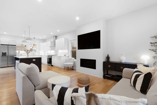 Fireplace, Interior, Kitchen, Living room, Pendant Lights, Recessed Lighting, Stainless Steel Appliances, Wood Texture Flooring