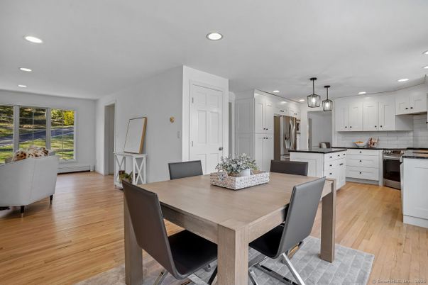 Dining room, Interior, Kitchen, Pendant Lights, Recessed Lighting, Stainless Steel Appliances, Wood Texture Flooring